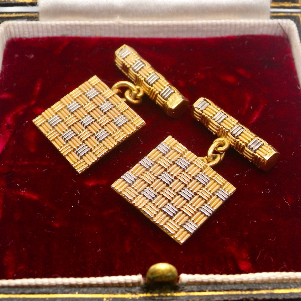 boxed A pair of 18 carat gold cuff links by famous London designer Roy King.