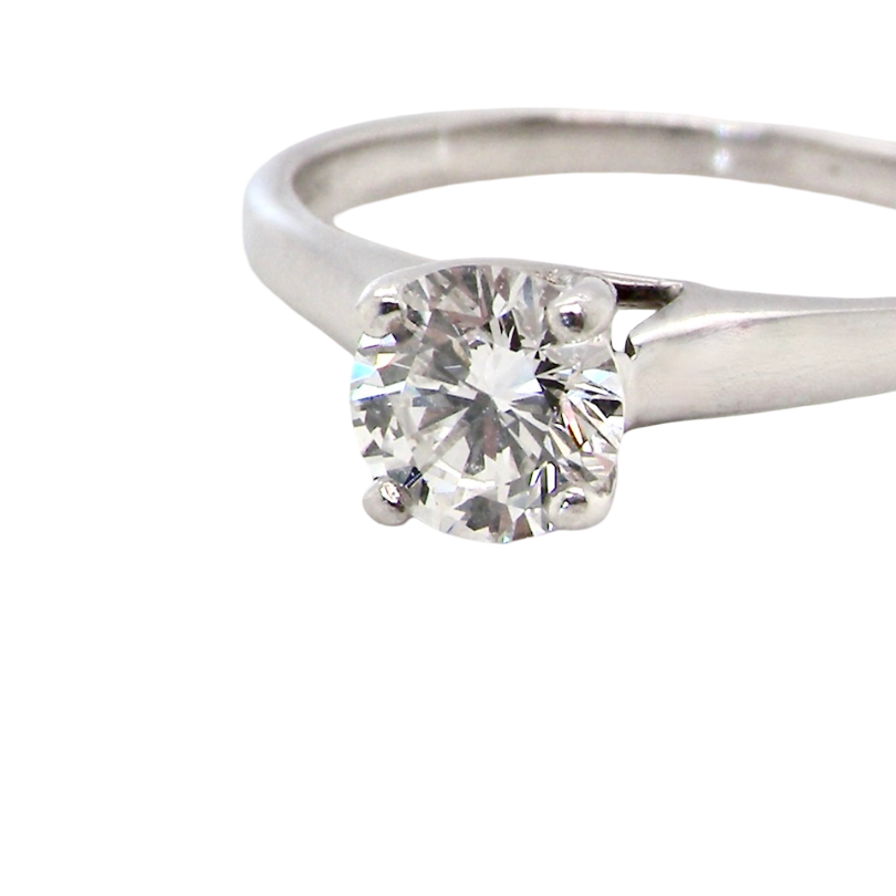 close up solitaire ring containing a fine modern brilliant cut white diamond. Measures 5.4mm (.53 carats)
Colour G-h, clarity Si. Modern feature under setting, depth 6.8mm, weight 2.6grams.