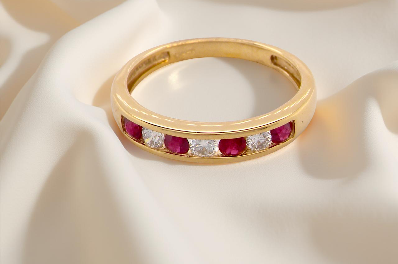 A channel set Ruby and Diamond ring