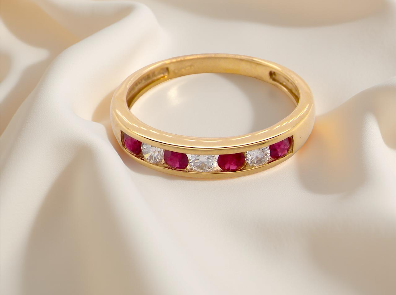 A channel set Ruby and Diamond ring