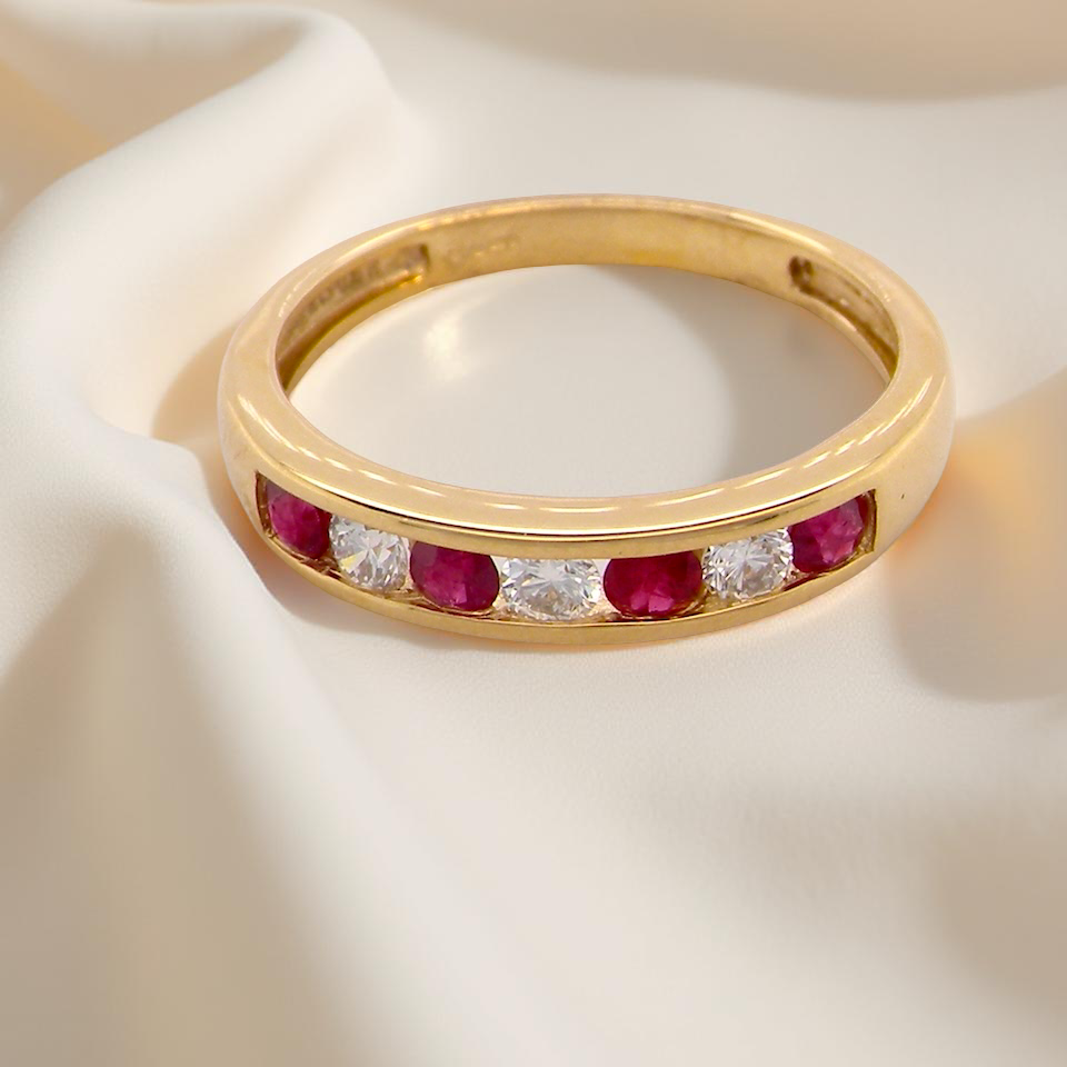 A channel set Ruby and Diamond ring