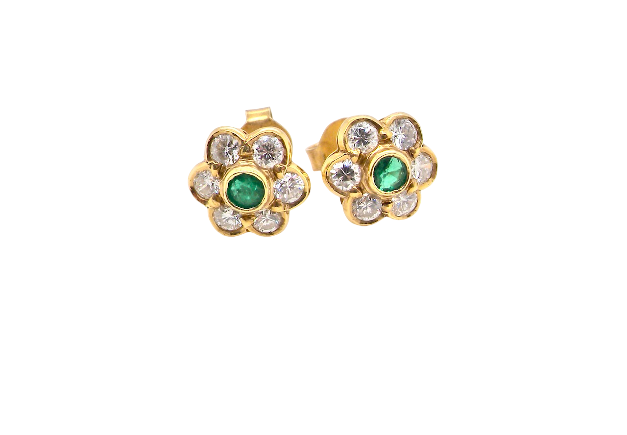 classic cluster earrings, each featuring a round emerald