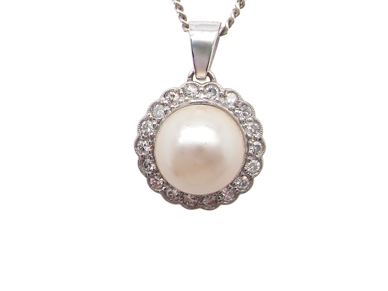 A Pearl and Diamond pendant