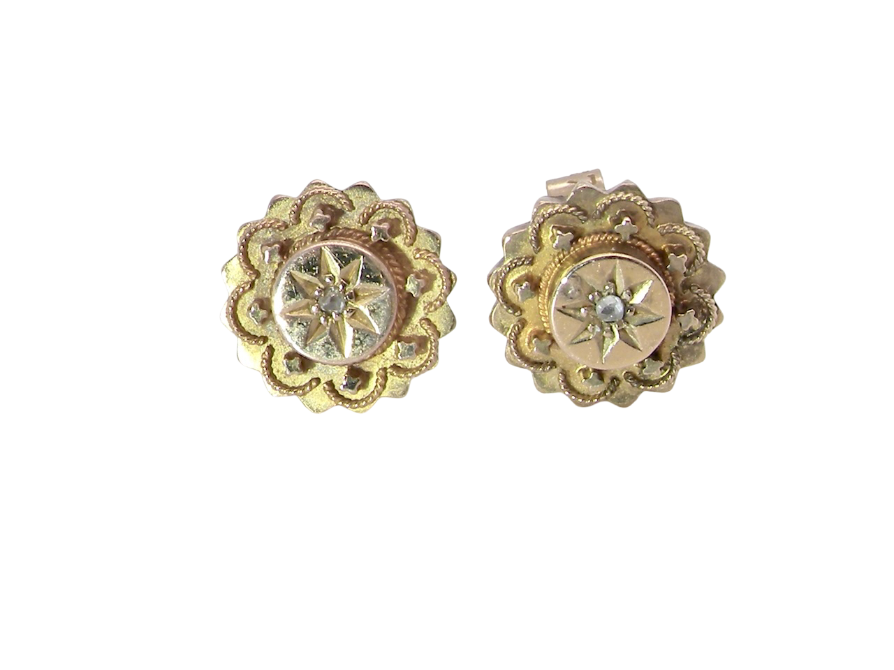 close pair of early 20th century earrings. Flower shaped,