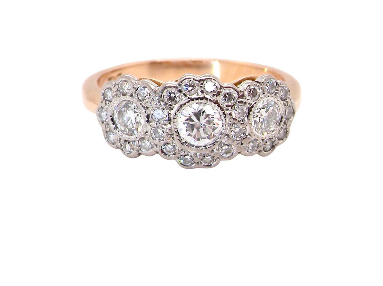 close up charming vintage triple cluster diamond ring,