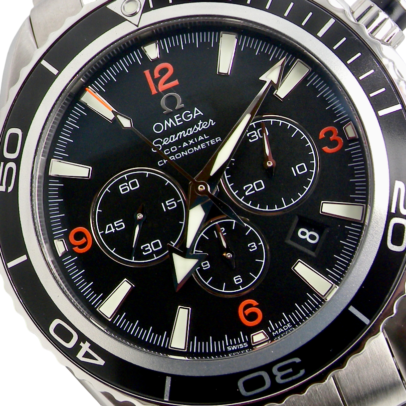 Omega Seamaster Co-Axial Chronograph watch with a black dial, silver stainless steel case, and a black rotating bezel with orange numerals.