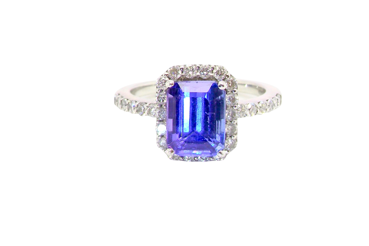 cluster ring featuring a 4A quality Tanzanite as its centre stone. A