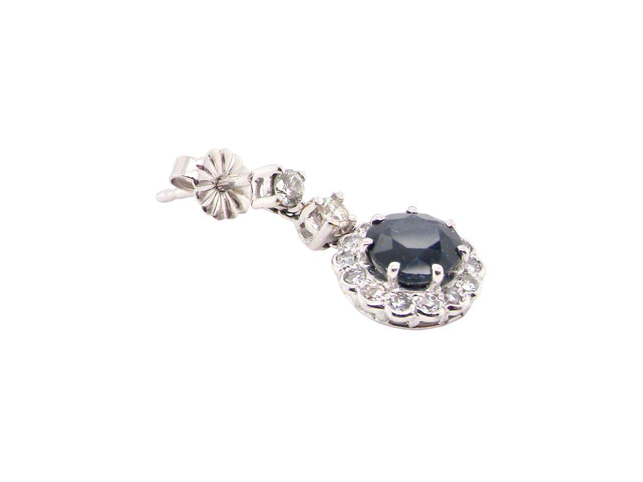 drop earring crafted in 18 carat white gold, each set with a striking inky blue-black sapphire measuring 7.5mm in diameter.