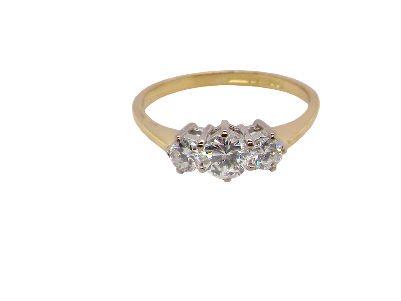 elegant modern trilogy ring is set with three brilliant-cut white diamonds in a timeless and meaningful design.