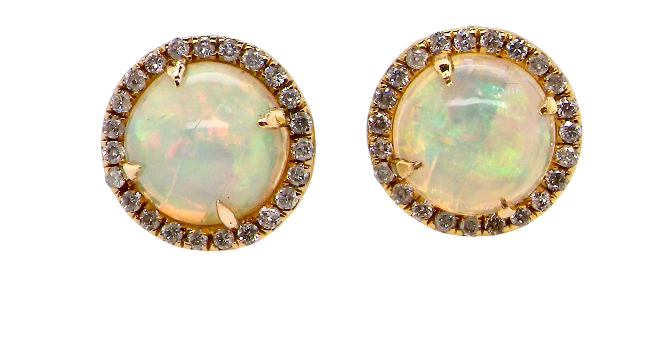 An exquisite pair of opal and diamond earrings