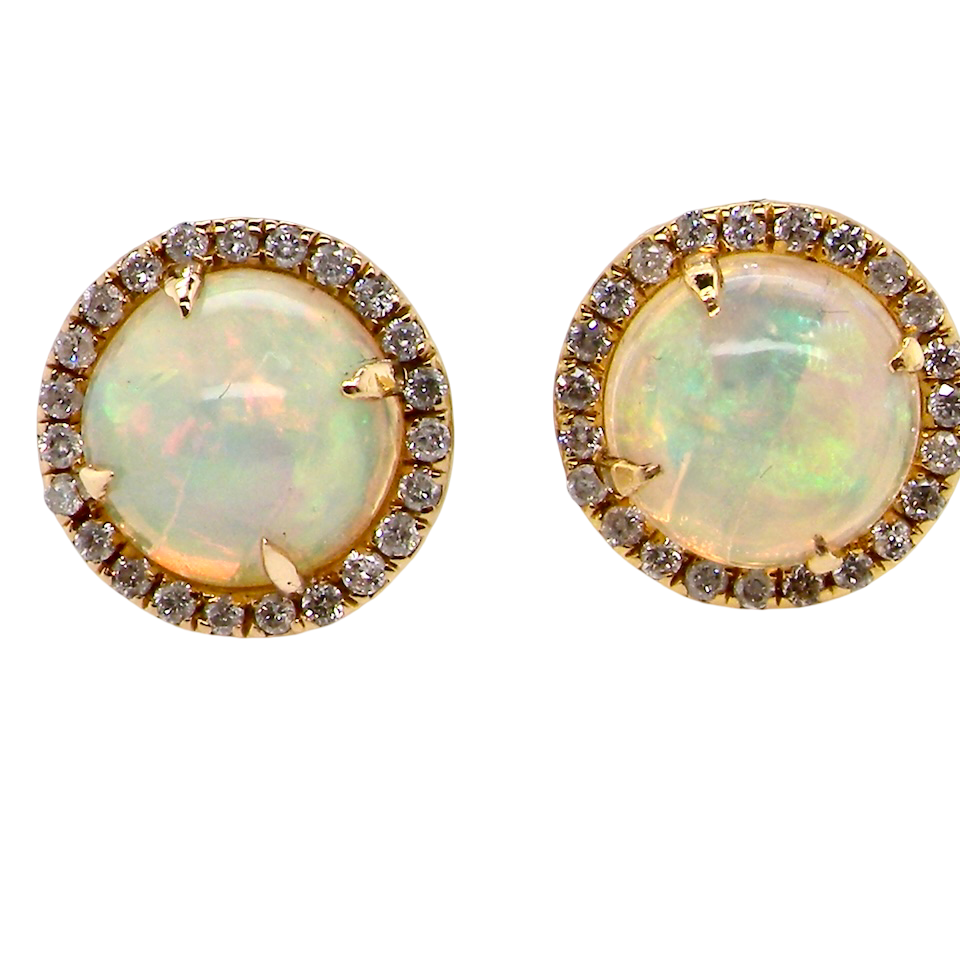 An exquisite pair of opal and diamond earrings
