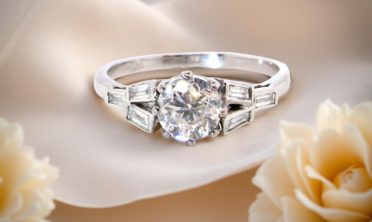 feature A beautifully proportioned Art Deco solitaire ring showcasing a sparkling old brilliant cut white diamond