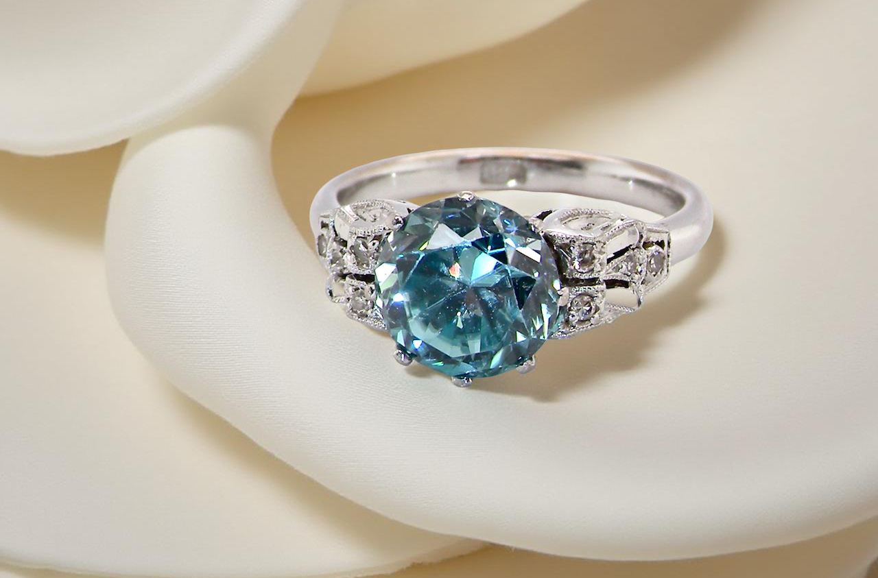 fine Art Deco ring that features a natural blue zircon centre stone