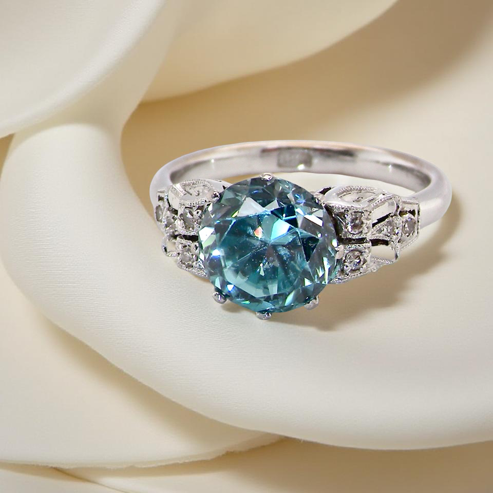 fine Art Deco ring that features a natural blue zircon centre stone