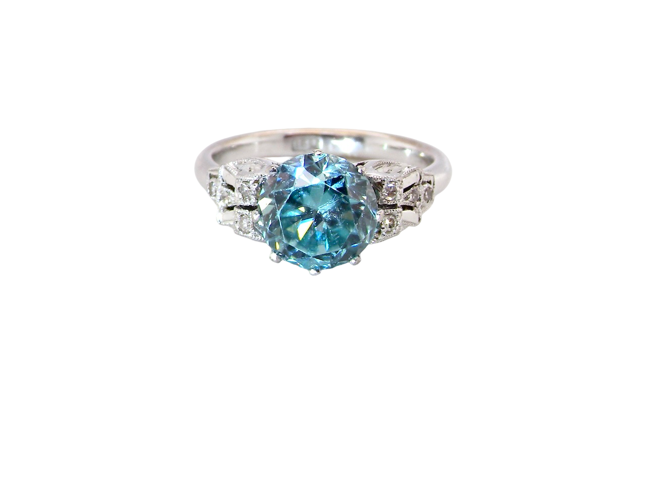 fine Art Deco ring that features a stunning natural blue zircon centre stone