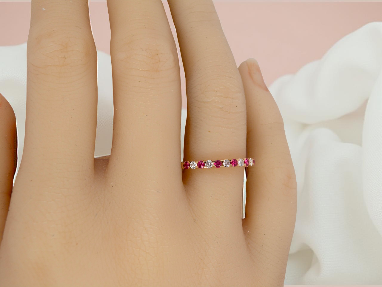 An 18 carat Ruby and Diamond eternity ring