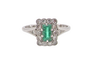 A vintage Emerald and Diamond Cluster ring
