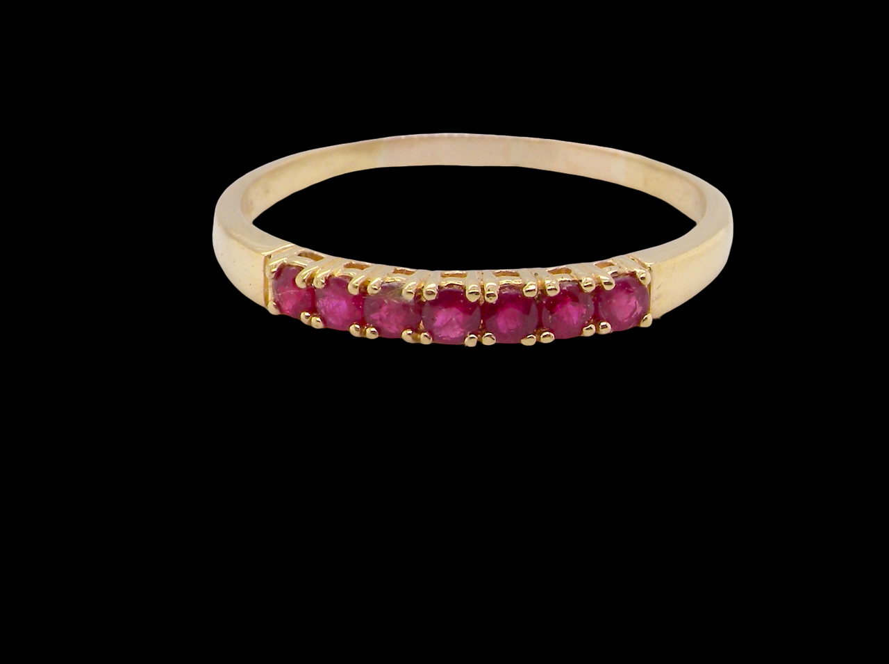 A half hoop ruby eternity ring
