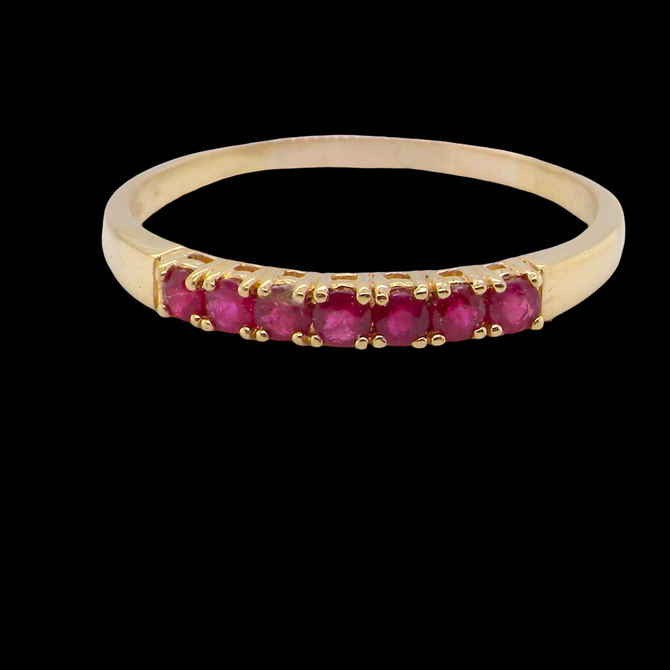 A half hoop ruby eternity ring