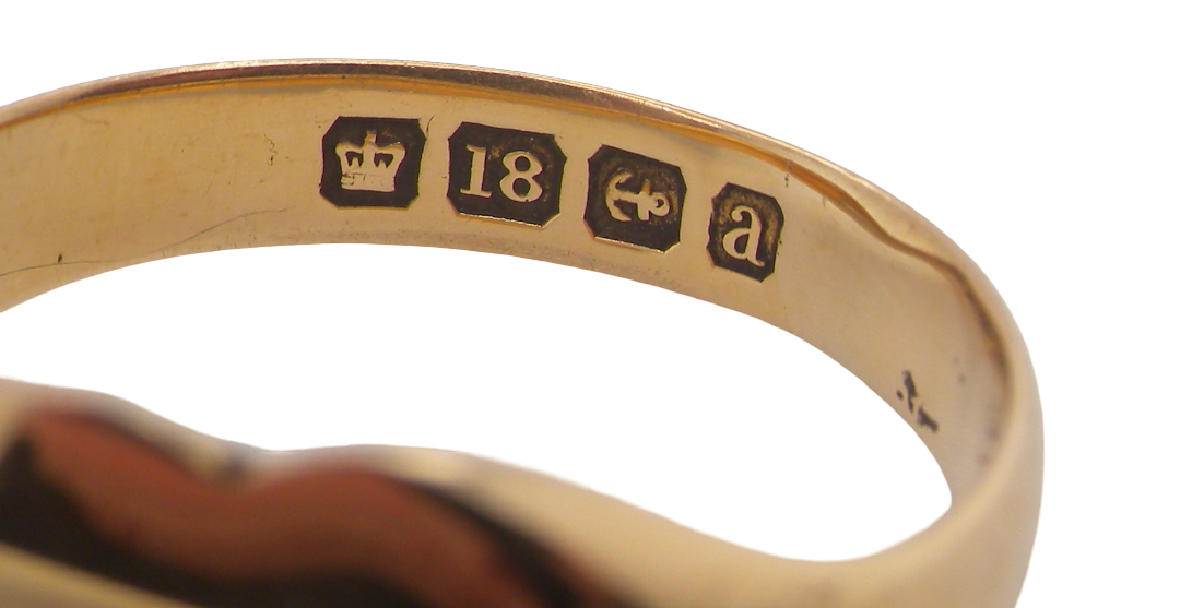 hallmark A very unusual signet ring, hallmarked in Birmingham in 1900.
The head is heart shaped and measures 11x10mm.