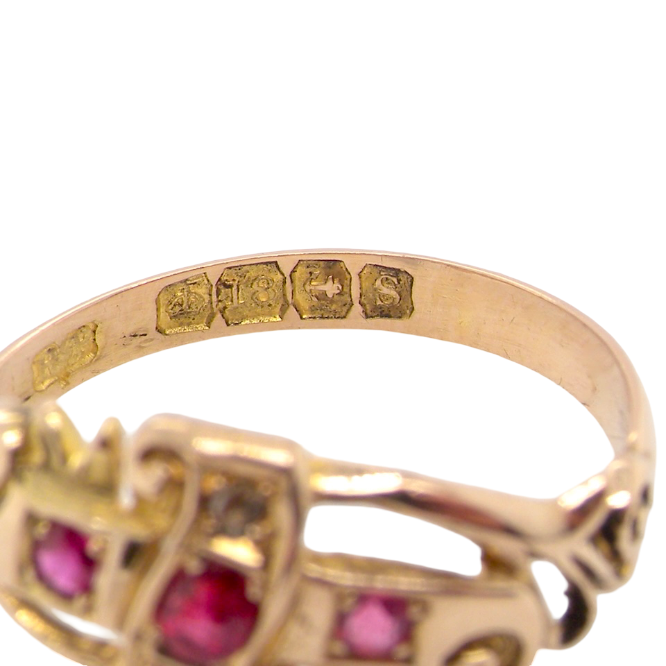 hallmarks An early 20th century ring. 18 carat gold, set with three rubies. 