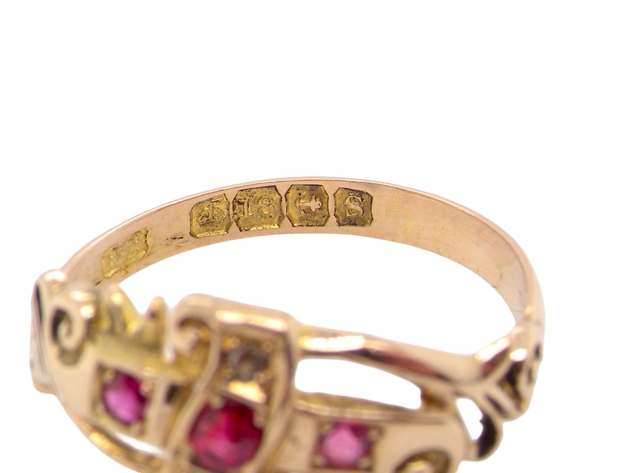 hallmarks An early 20th century ring. 18 carat gold, set with three rubies. 
