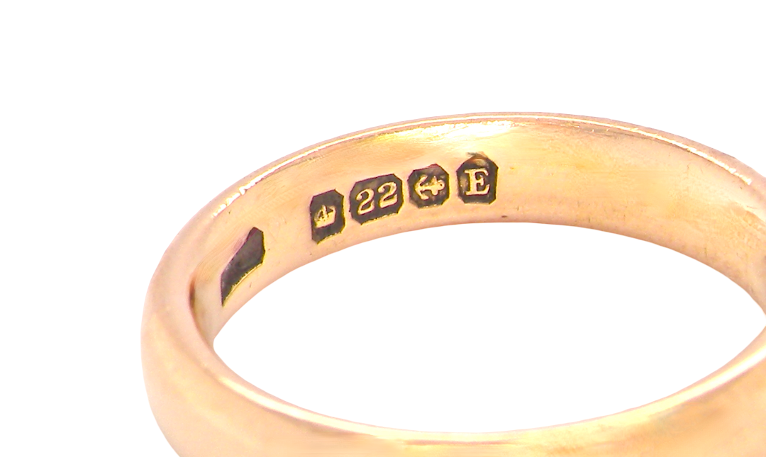 hallmarks wedding ring is 22 carat gold, just 2 points off pure.
3.6mm width, 1.9mm depth, weight 5.2grams. A lovely deep gold colour and patina.