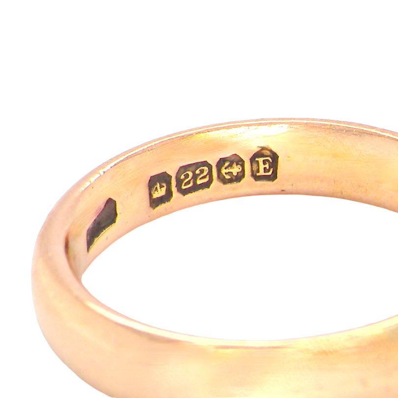hallmarks wedding ring is 22 carat gold, just 2 points off pure.
3.6mm width, 1.9mm depth, weight 5.2grams. A lovely deep gold colour and patina.