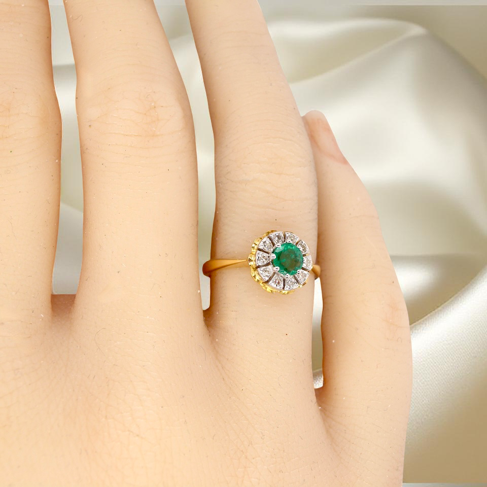 A 1980's Emerald and Diamond ring