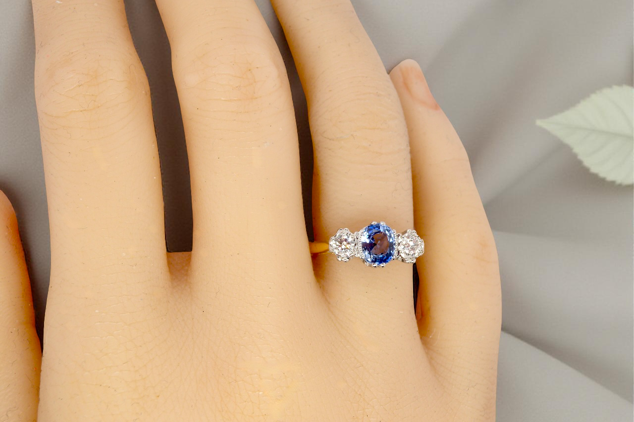 hand A 3 stone sapphire and diamond ring-A