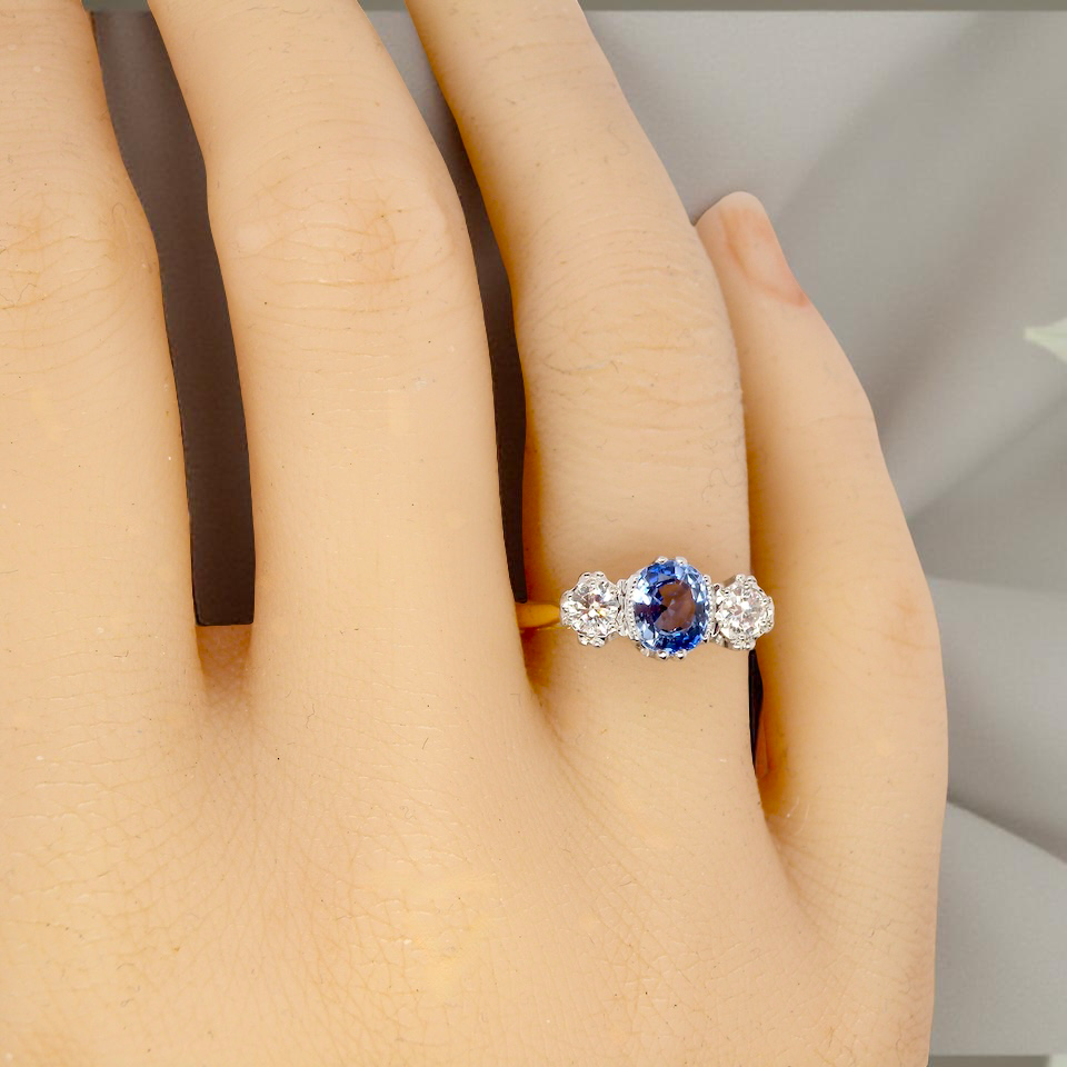 hand A 3 stone sapphire and diamond ring-A