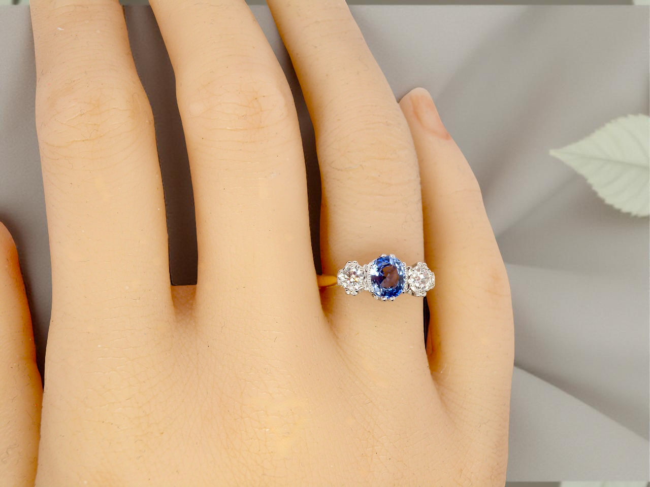hand A 3 stone sapphire and diamond ring-A