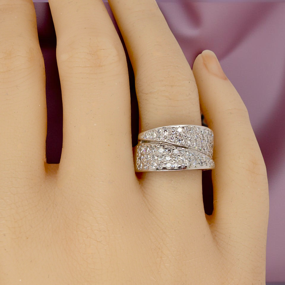 A Fabulous Diamond Crossover Cocktail Ring on a Hand