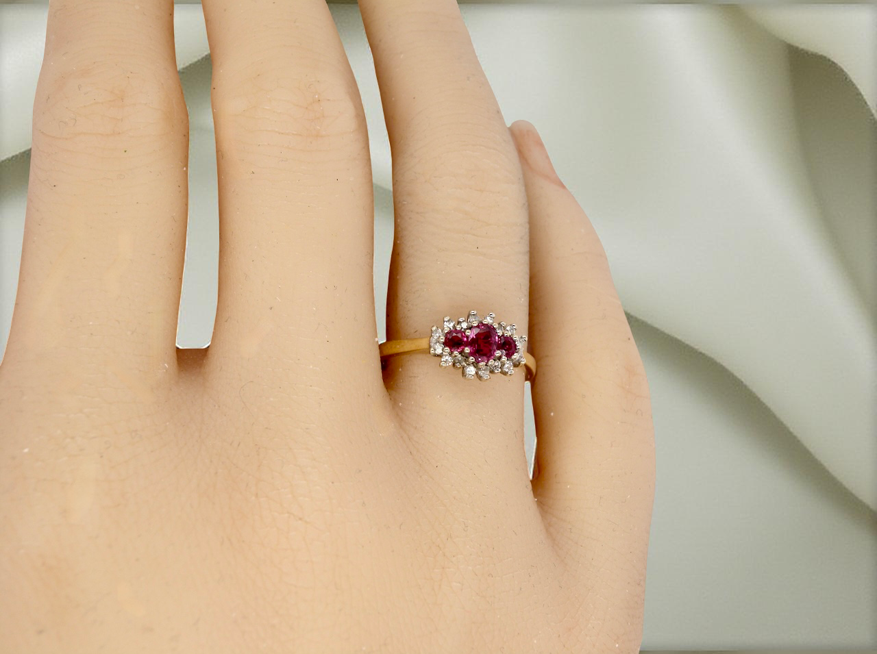 A Ruby & Diamond Ring on a Finger