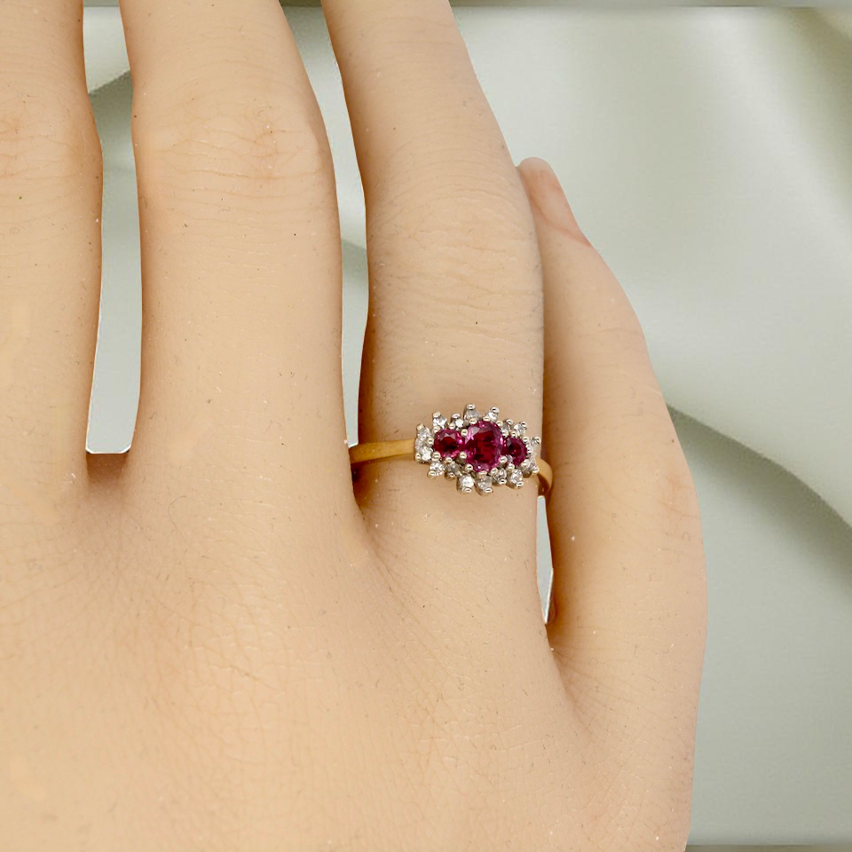 A Ruby & Diamond Ring on a Finger