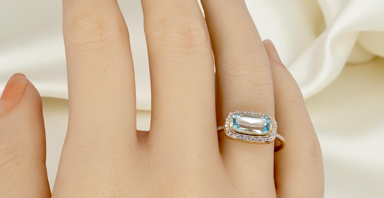 A Modern Vintage Style Blue Topaz & Diamond Cluster Ring