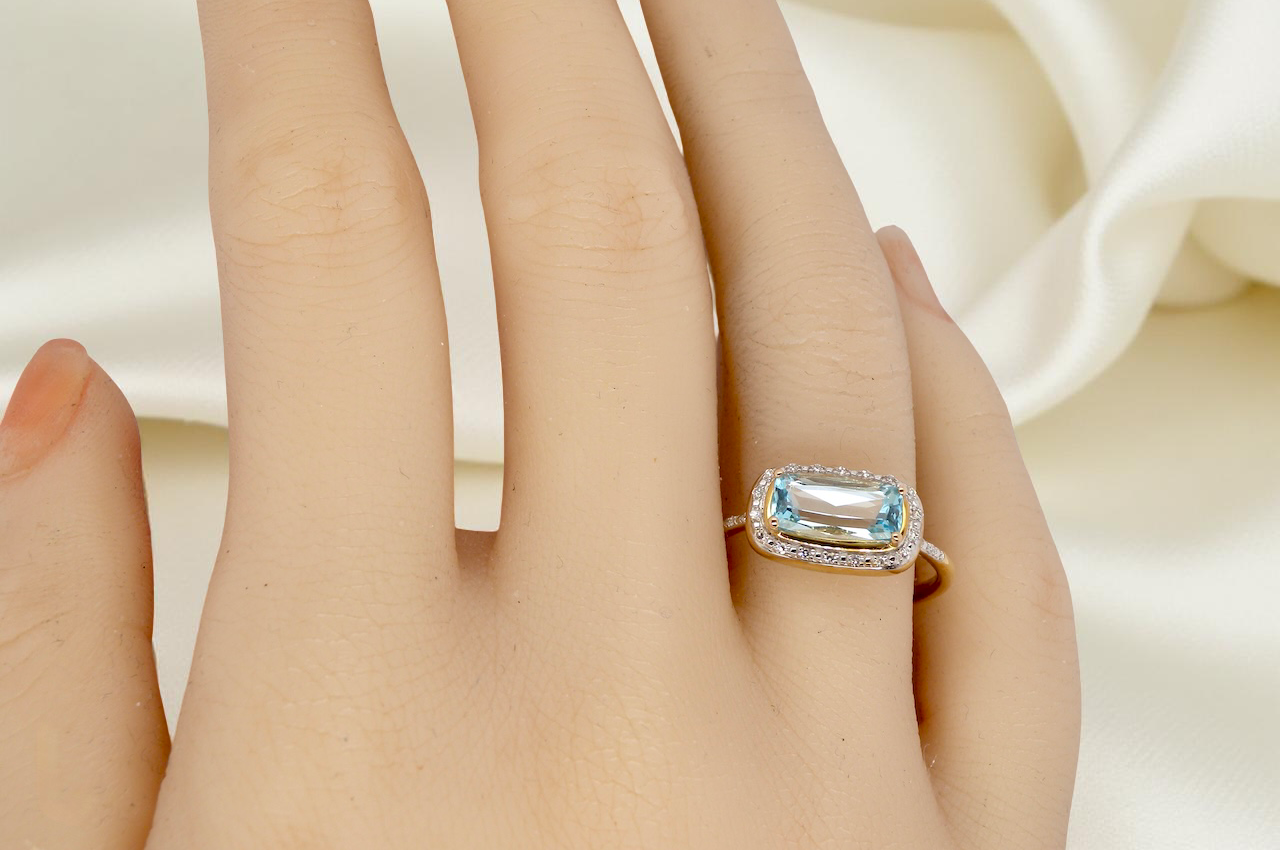 A Modern Vintage Style Blue Topaz & Diamond Cluster Ring