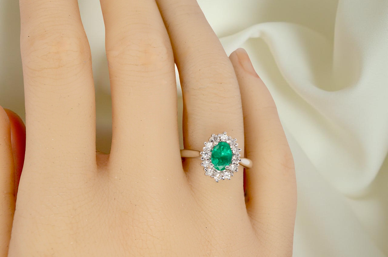 A NEW Emerald and Diamond ring