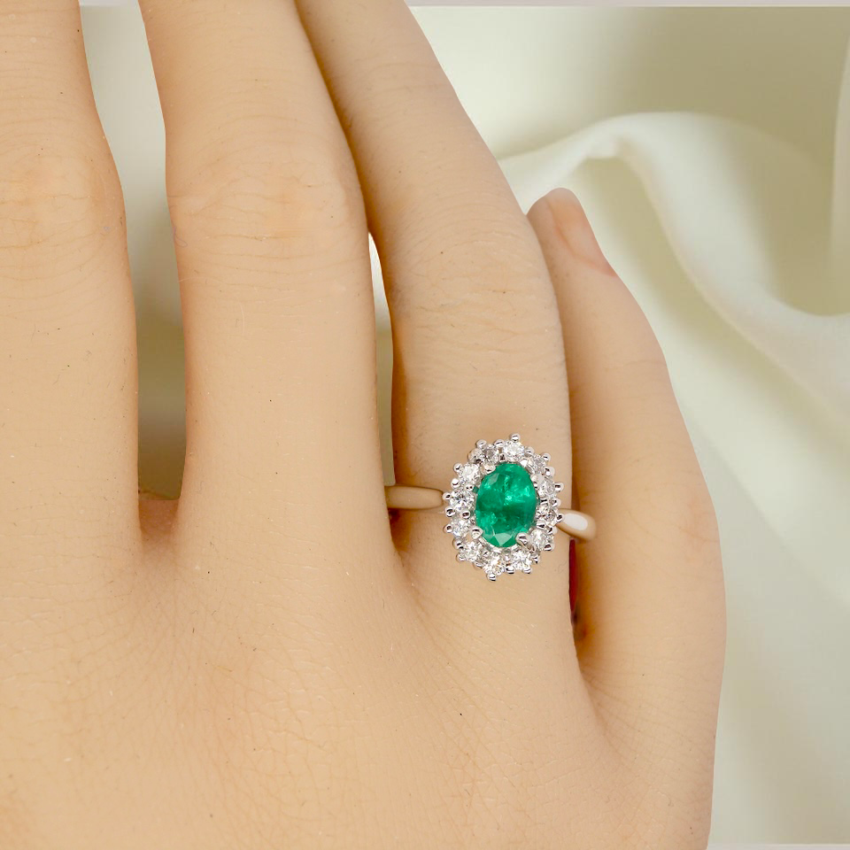 A NEW Emerald and Diamond ring