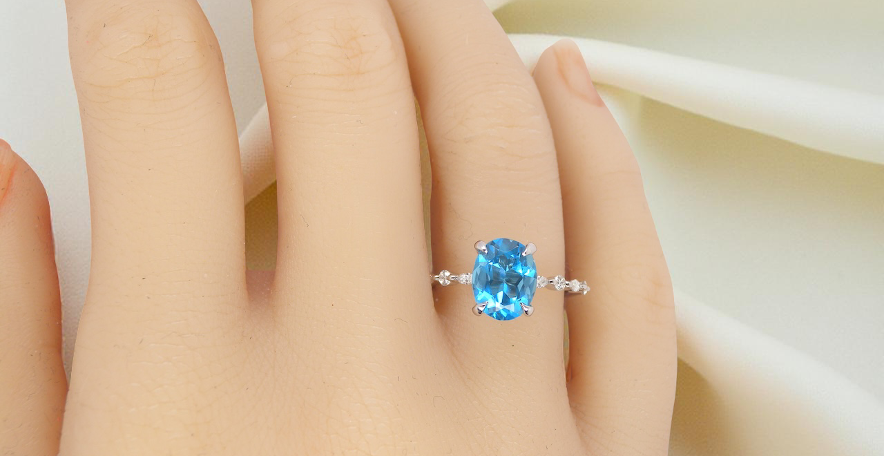 hand A NEW ring- but with a gemstone that we have taken from an old ring that was worn out, so its a new lease of life! The topaz measures 9x7mm.