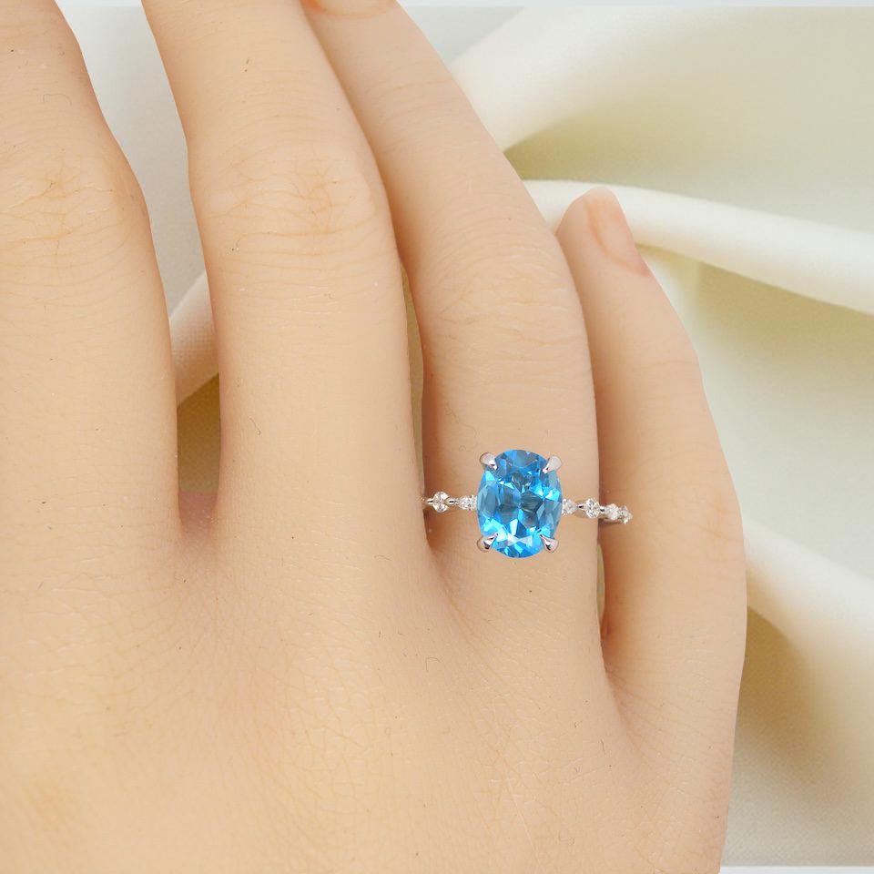 hand A NEW ring- but with a gemstone that we have taken from an old ring that was worn out, so its a new lease of life! The topaz measures 9x7mm.