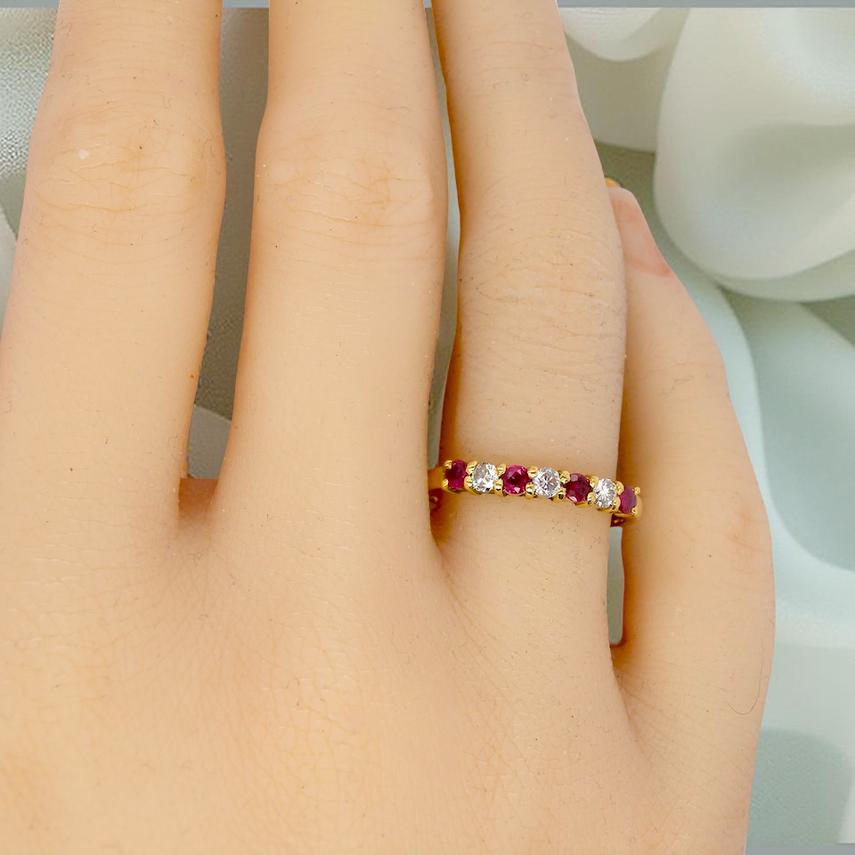 A Ruby and Diamond eternity ring 7 stone