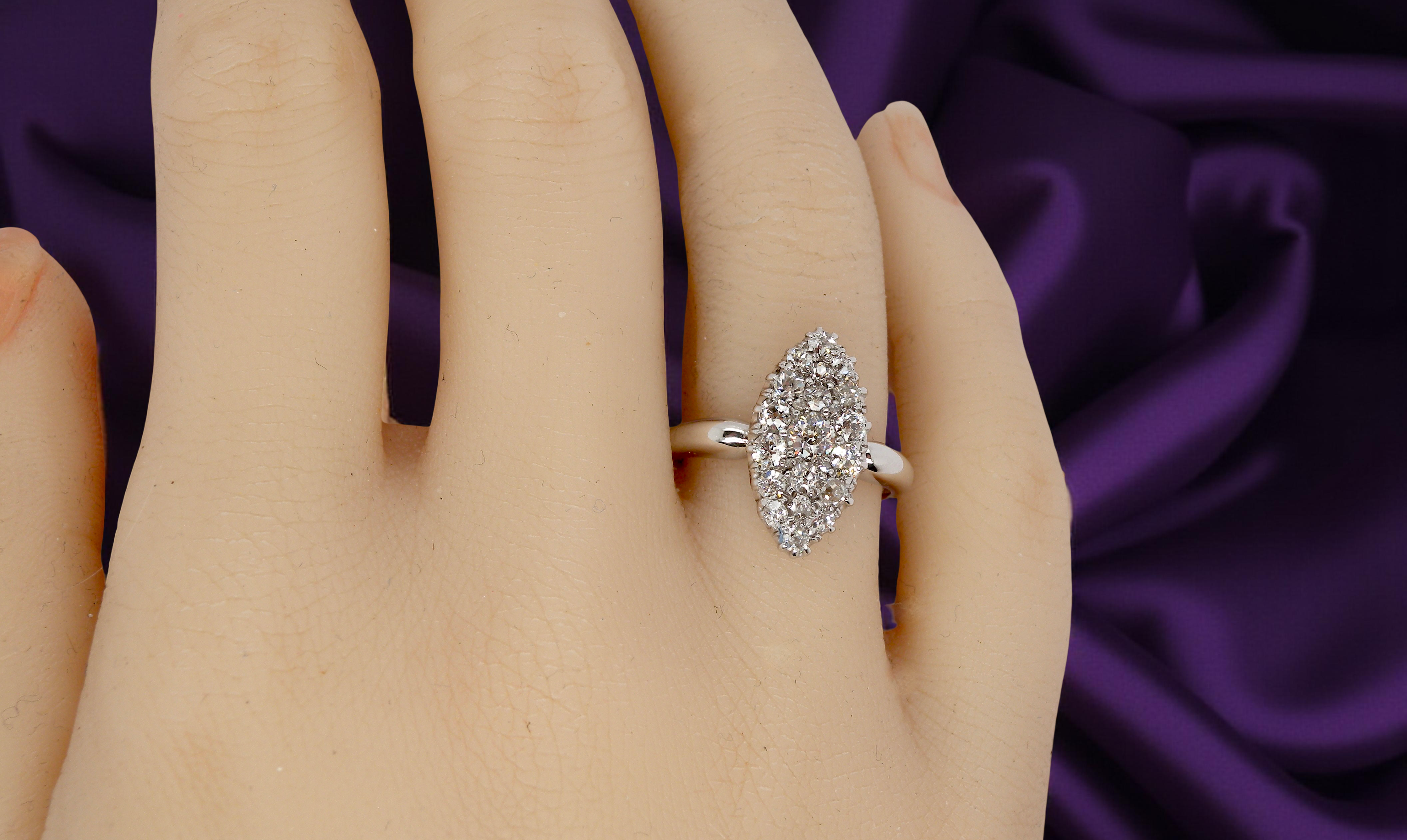 A Stunning Marquise Cluster Diamond Ring – 18 carat White Gold (1950s–1960s Vintage) on a hand