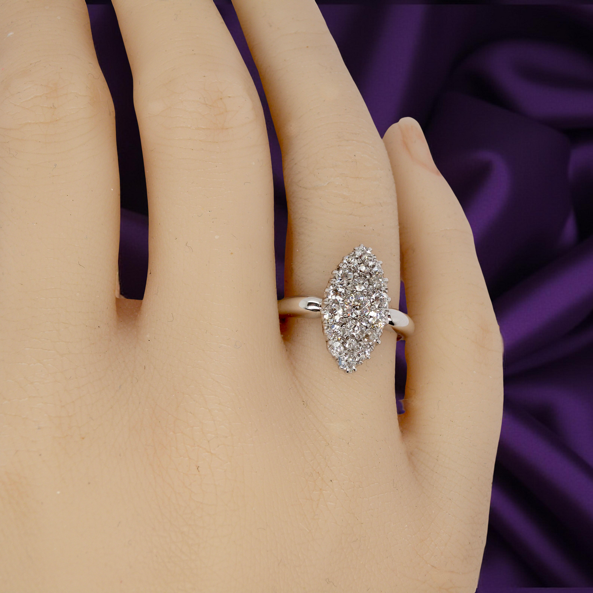 A Stunning Marquise Cluster Diamond Ring – 18 carat White Gold (1950s–1960s Vintage) on a hand