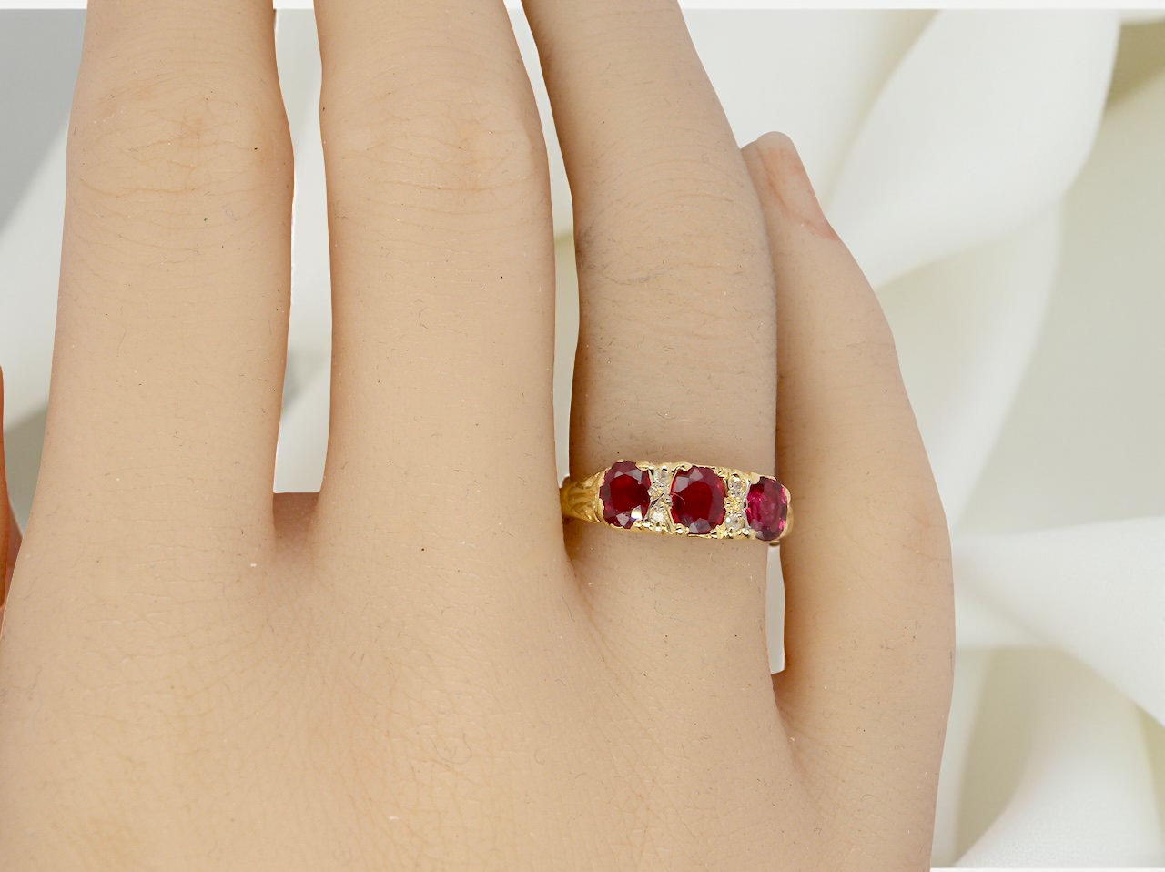 A Victorian Style 18 carat Gold Ruby & Diamond Boat Ring (London 1978)