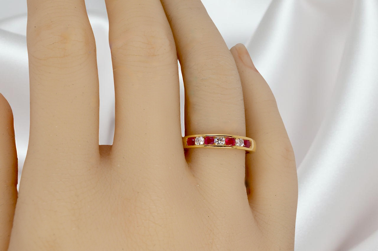A channel set Ruby and Diamond ring