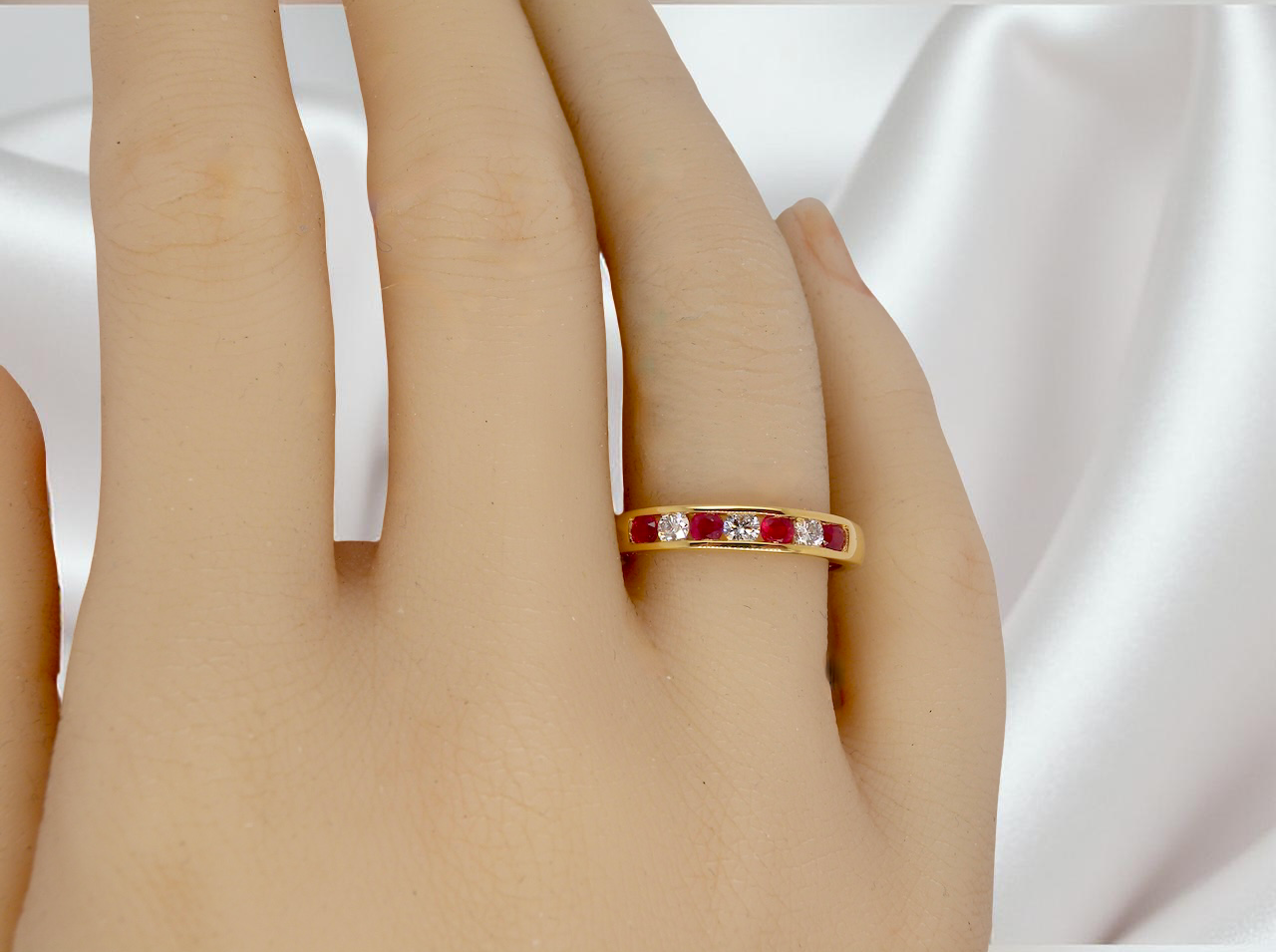 A channel set Ruby and Diamond ring