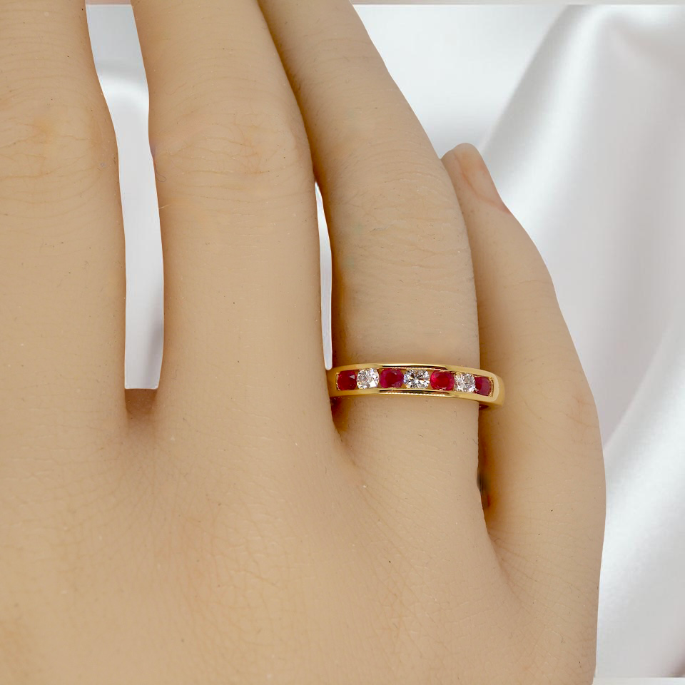 A channel set Ruby and Diamond ring