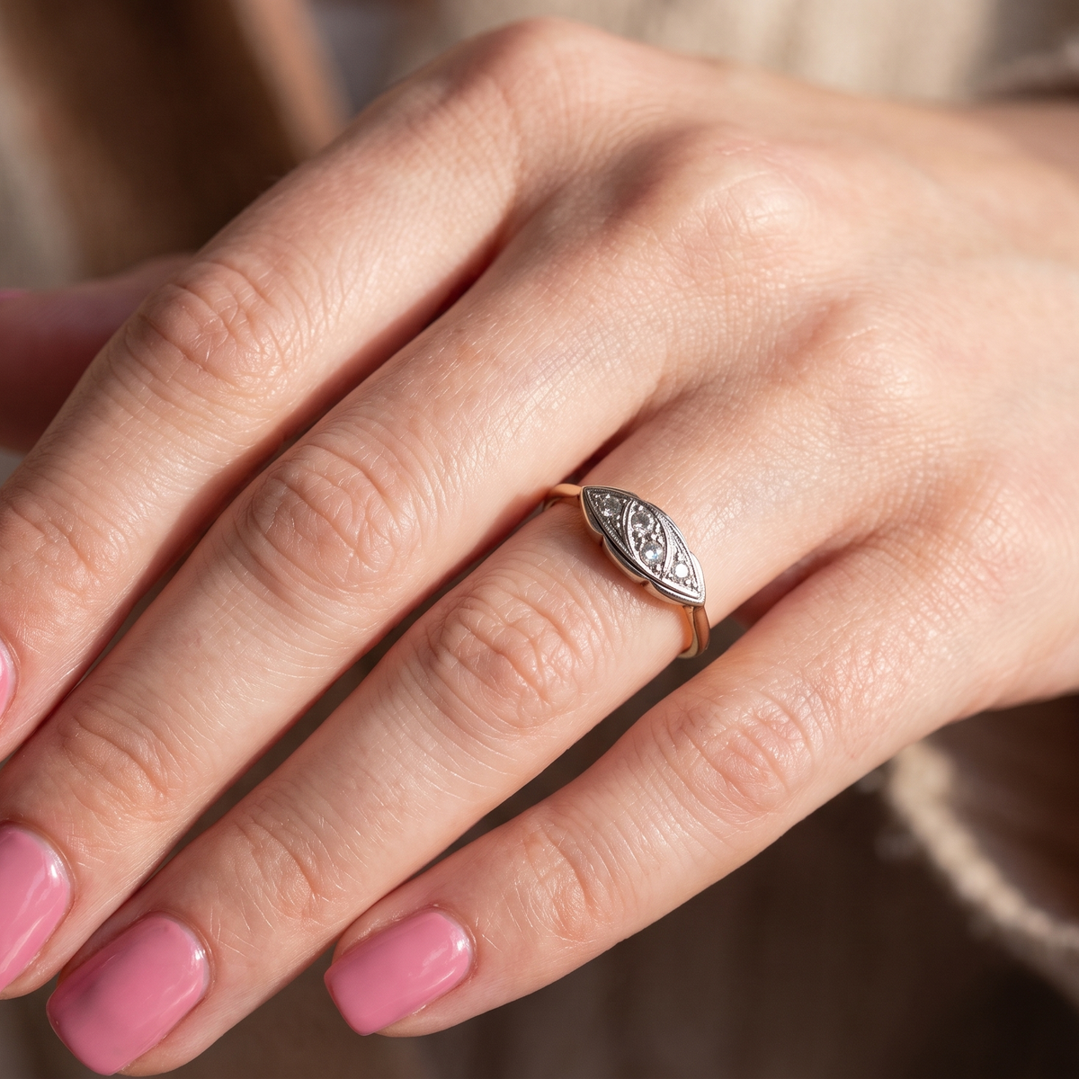 hand A charming early 20th century diamond ring, featuring a beautifully proportioned navette-shaped head,
