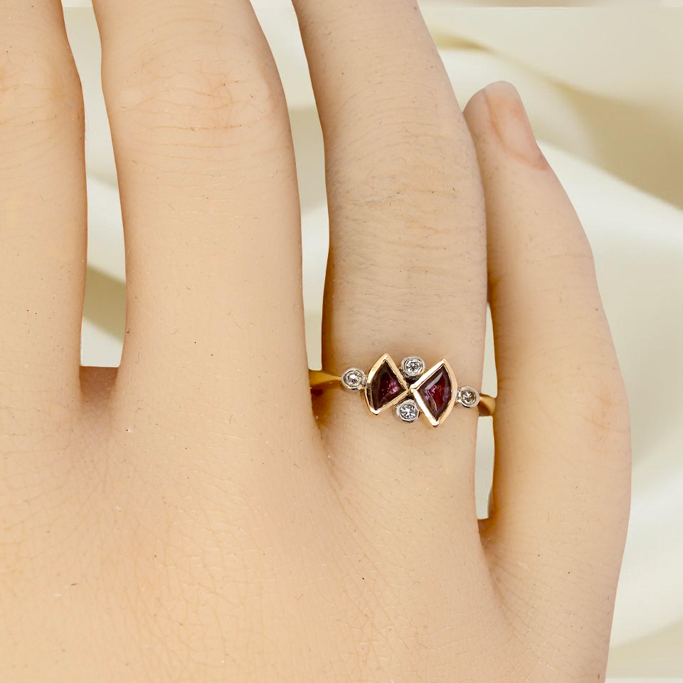 A pink tourmaline and diamond ring